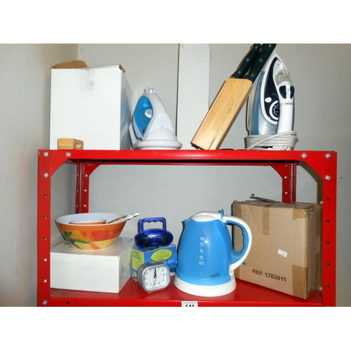 141 - A quantity of mainly new and boxed items, including irons, coffee makers, small pans,  etc. (2 irons... 