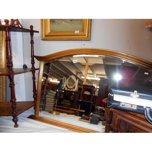 2183 - A gilt framed bevel edged over mantel mirror.