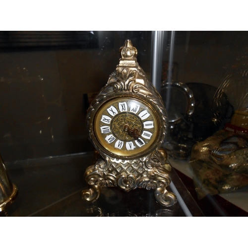 1139 - Two small mantel clocks depicting windmills, a battery lantern clock and a battery carriage clock.