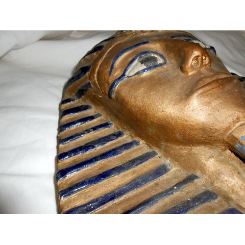 231 - A clay model of Tutankhamun death mask, a/f