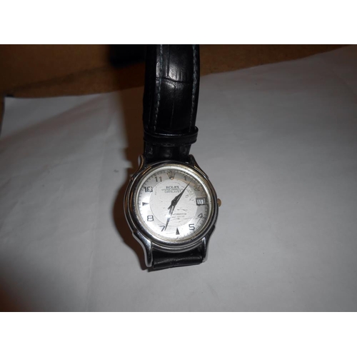 2055 - A Rolex Oyster perpetual date set wrist watch on replacement strap.