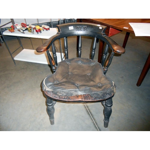 2375 - A Victorian monogrammed captain's chair.