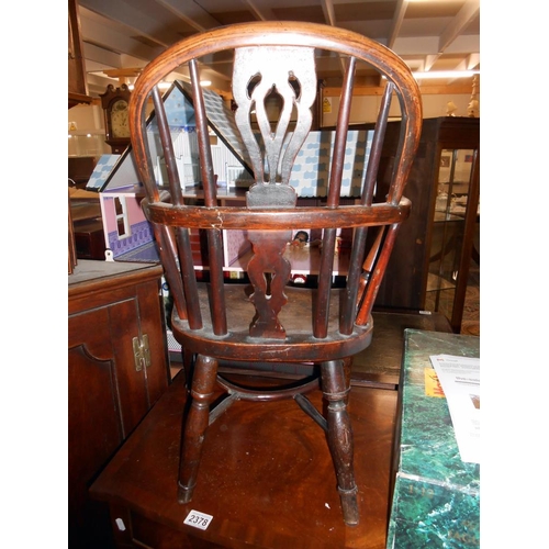 2377 - A Whetland Rockley ash/elm/yew child's Windsor chair.