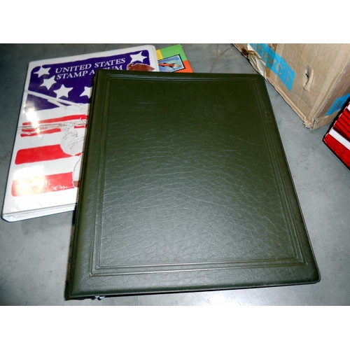 1237 - A box of stamp albums including USA, GB etc.,