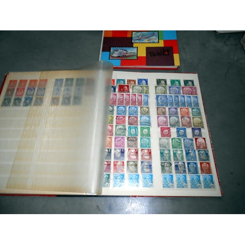 1237 - A box of stamp albums including USA, GB etc.,