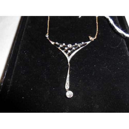 2009 - A stylish designer 18ct white gold and diamond necklace with diamond drops.