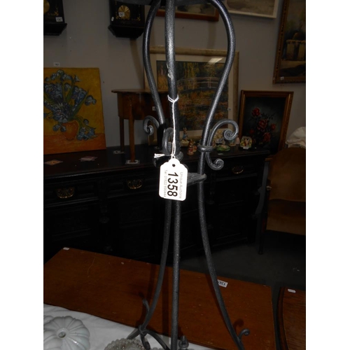 1358 - A wrought iron plant stand.