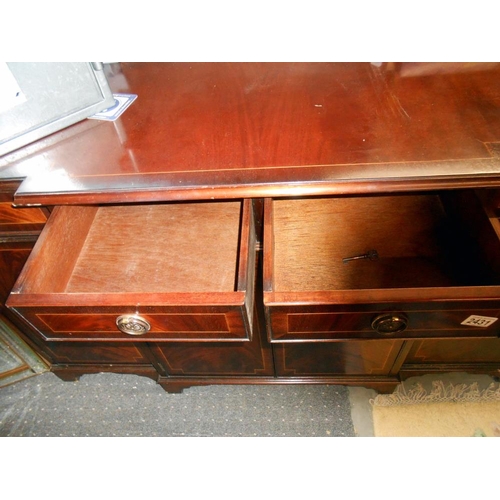 2431 - A mahogany string inlaid break front sideboard in clean condition.