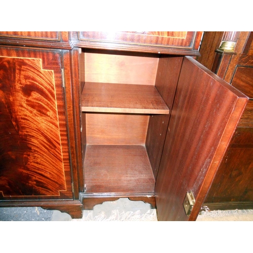 2431 - A mahogany string inlaid break front sideboard in clean condition.