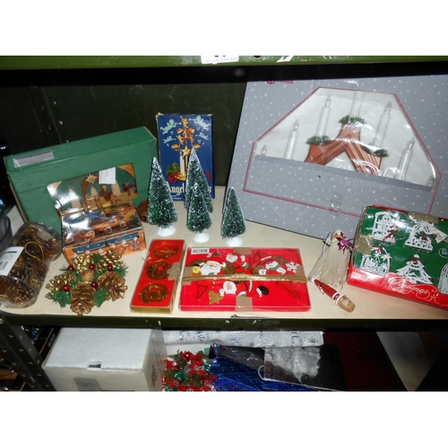 56 - 3 shelves of Christmas decorations including nativity figures and vintage items