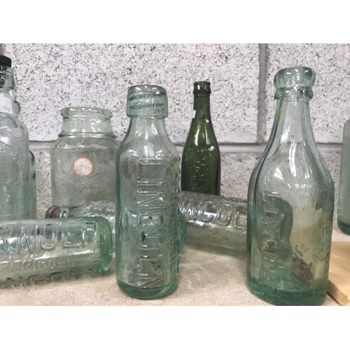 24 - A collection of mainly Lincoln bottles/jars