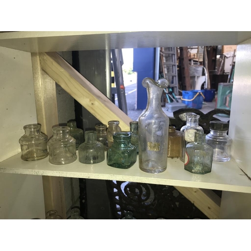 54 - 6 shelves of potion bottles