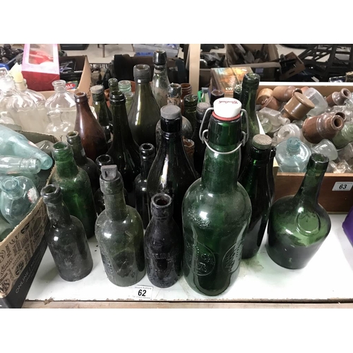 62 - A good lot of larger green/brown bottles/jars