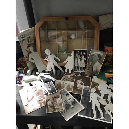 75 - A collection of stencils, photo's, tins & display cabinet etc.