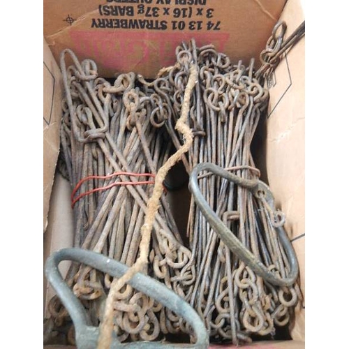 107 - Two sets of old surveyor's chains.