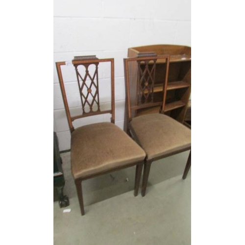 2711 - A pair of mahogany inlaid chairs.