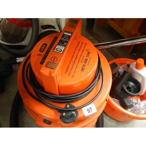 97 - A vacuum cleaner.