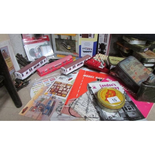 10 - A mixed lot of vintage tins (most with contents) together with a mixed lot of railway related items.