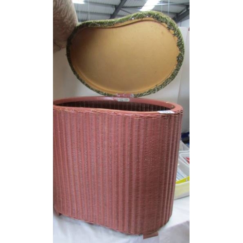 103 - A Lloyd Loom 'Lusty' laundry bin, in good condition. (Collect only)