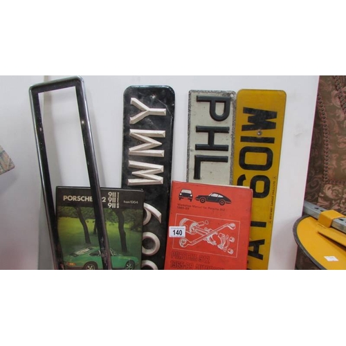 140 - A mixed lot of spanners, motoring books etc.,