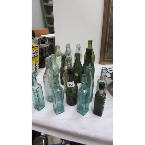 151 - A mixed lot of old bottles.