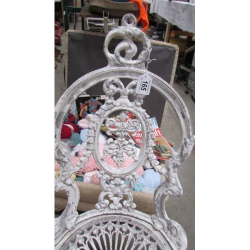 165 - A cast iron garden chair. (Collect only)