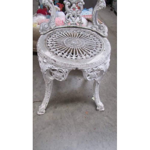 165 - A cast iron garden chair. (Collect only)