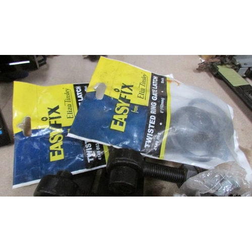 22 - A new collection of black gate hardware, hinges etc.,