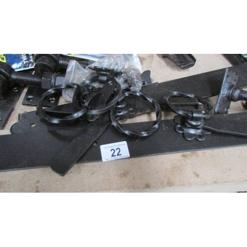 22 - A new collection of black gate hardware, hinges etc.,