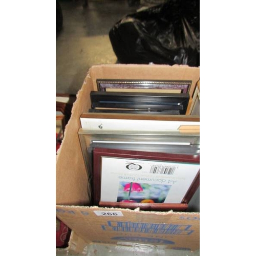 266 - Four boxes of pictures, mirrors and photo framed. (Collect only)