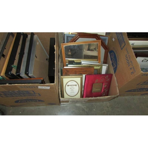 266 - Four boxes of pictures, mirrors and photo framed. (Collect only)