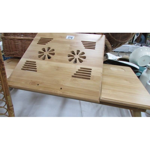 278 - A reading table and a quantity of basket ware (Collect only)