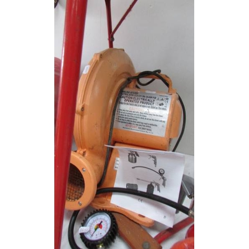 349 - A tested working air blower for inflatables and an unused compressor accessories kit. (Collect only)