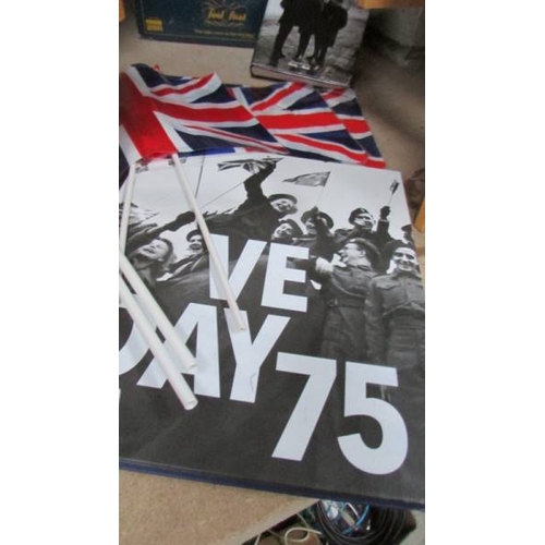 37 - A VE Day 75 hard back book, The 'Unseen Archives' Beatle book, a Trivial Pursuit and a portable colo... 