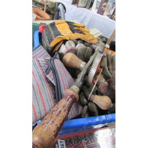 47 - A shelf full of gloves/straps/clamps/ u bolts and a tap and die set.