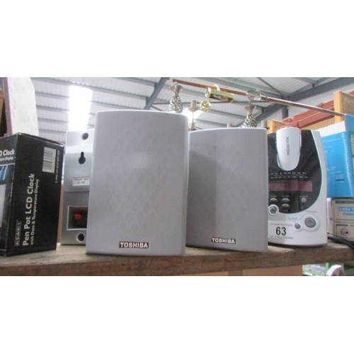 63 - A mixed lot including clocks, walkie talkie, speakers etc.,