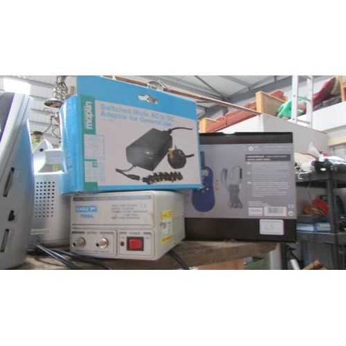 63 - A mixed lot including clocks, walkie talkie, speakers etc.,