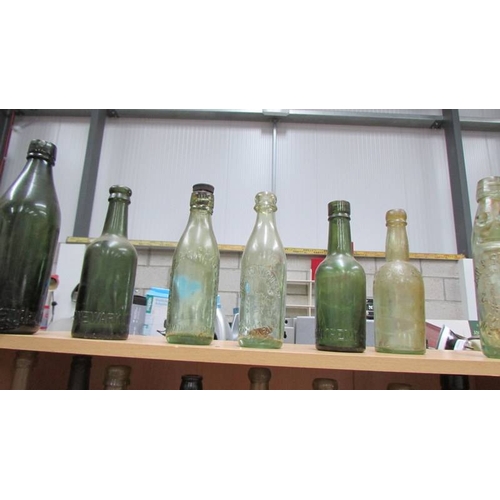 72 - Three shelves of old bottles. (Collect only)
