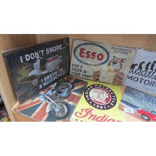 73 - Eight metal advertising signs and a wooden example.