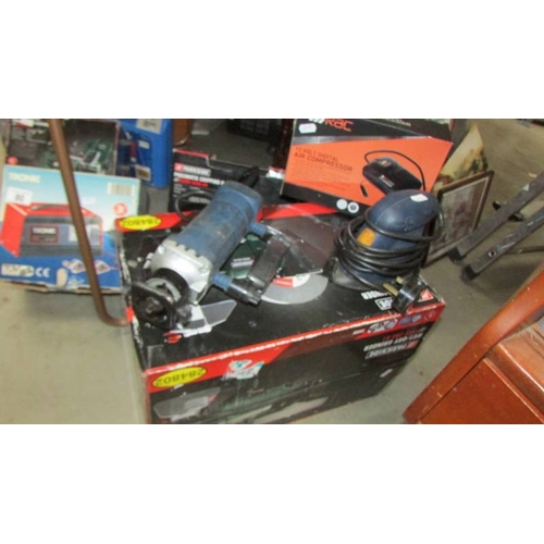 80 - A good lot of boxed and unboxed tools including wet/dry grinder, Pnuematic chipping hammer etc., (Co... 