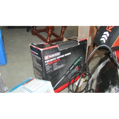 80 - A good lot of boxed and unboxed tools including wet/dry grinder, Pnuematic chipping hammer etc., (Co... 