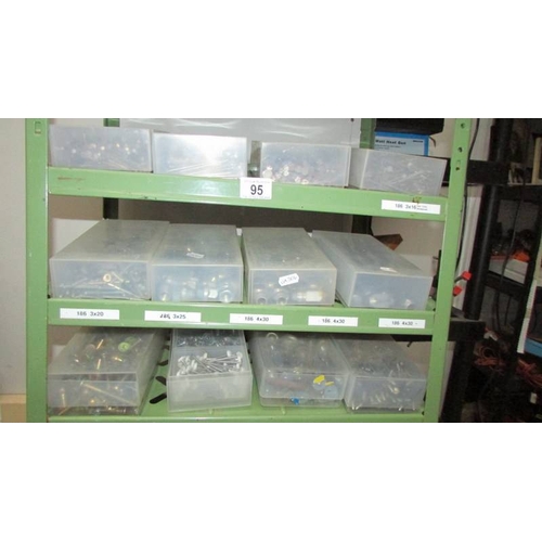95 - A green metal shelf unit with 40 boxes of assorted screws, nails etc., (Collect only)