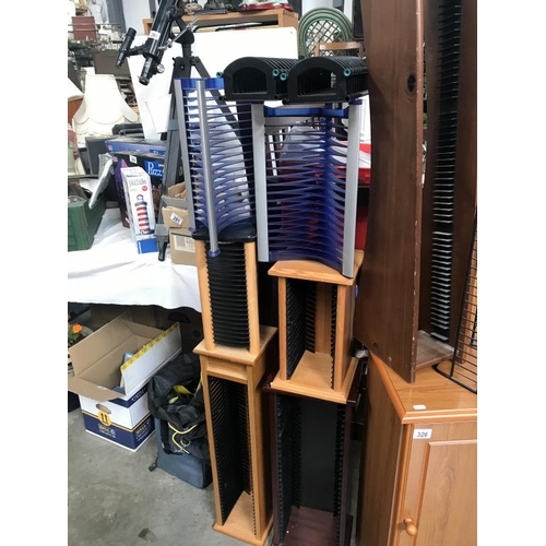 326 - A good lot of CD and DVD stands. (Collect only)