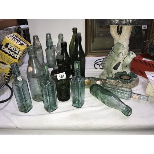 151 - A mixed lot of old bottles.