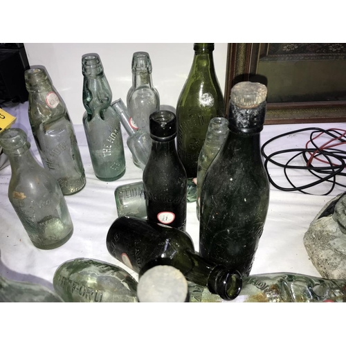 151 - A mixed lot of old bottles.