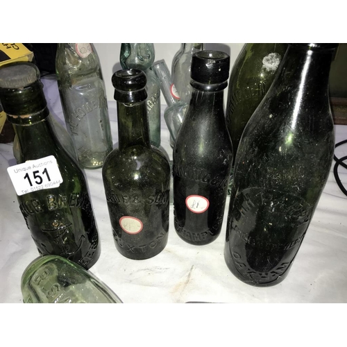 151 - A mixed lot of old bottles.
