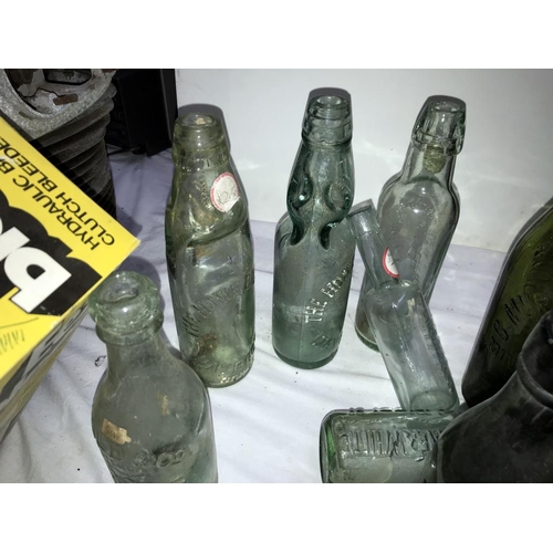 151 - A mixed lot of old bottles.