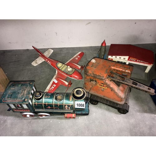 1008 - A selection of large play worn tin plate toys in various conditions