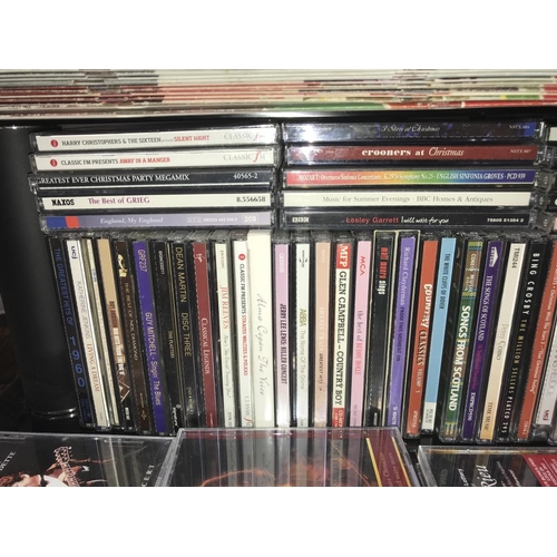 1033 - A large quantity of CD's including quantity of compilation film DVD's