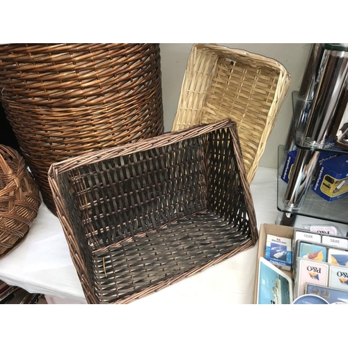 1042 - A wicker linen basket, shopping basket & 2 others.  (Collect only)